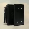 Gefaltete Lederbrieftasche Gefaltete Lederbrieftasche
