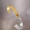 Maison Margiela Manschette mit verdrehter Nummer Maison Margiela Manschette mit verdrehter Nummer